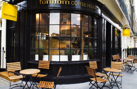 TomTom Grade II listed shopfront, with outdoor seating.