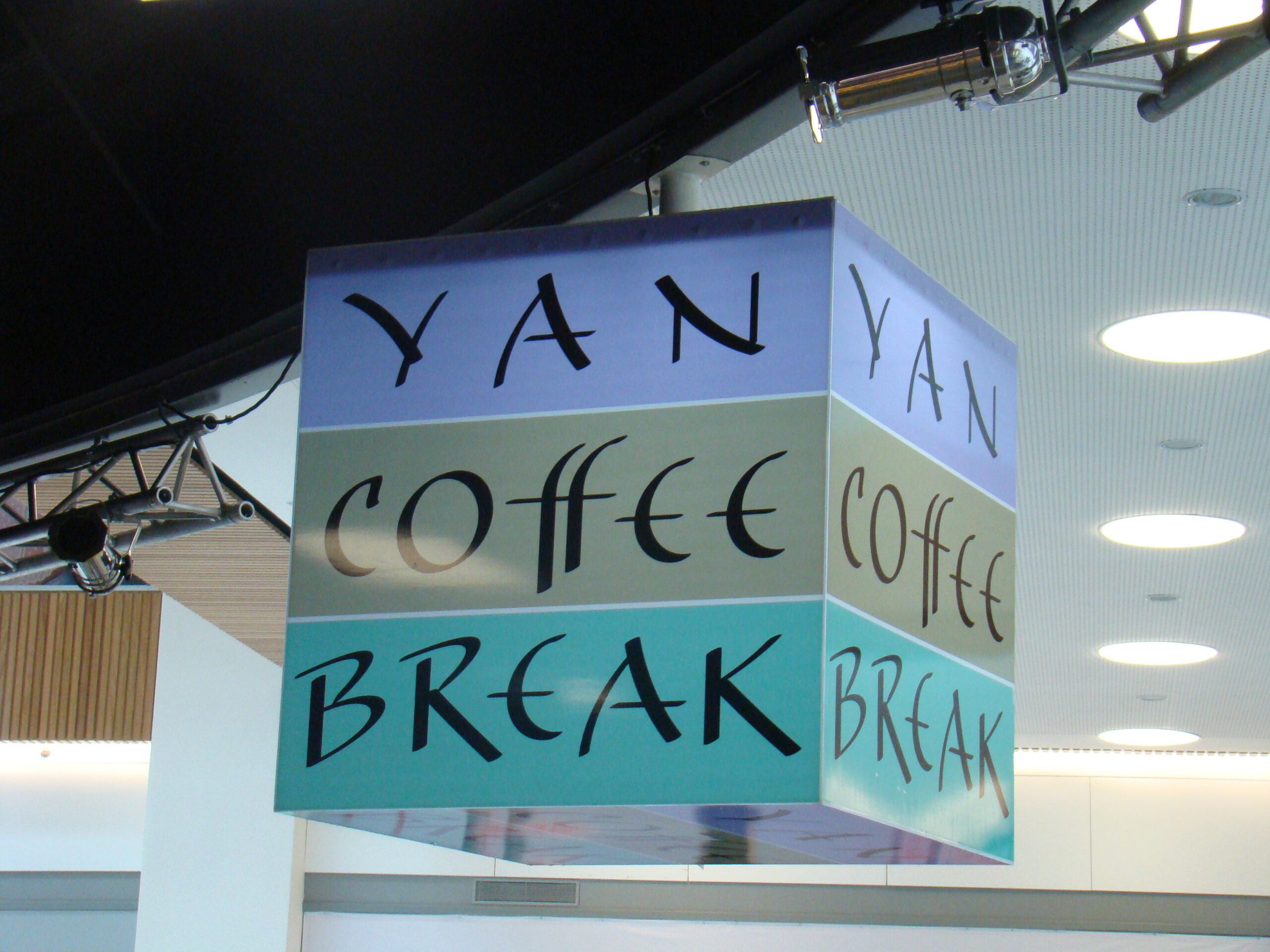 Yan Coffee Break illuminated shop sign.